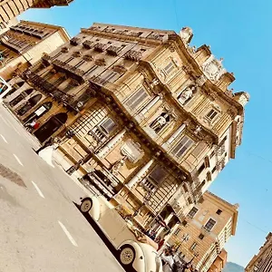 https://giovenchis-apartment.palermohotels.org